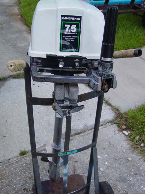Gamefisher 7.5 outboard motor from Sears. 